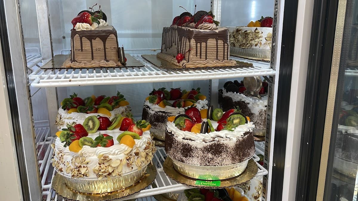 Wedding cake by Panaderia Flores Rose Park