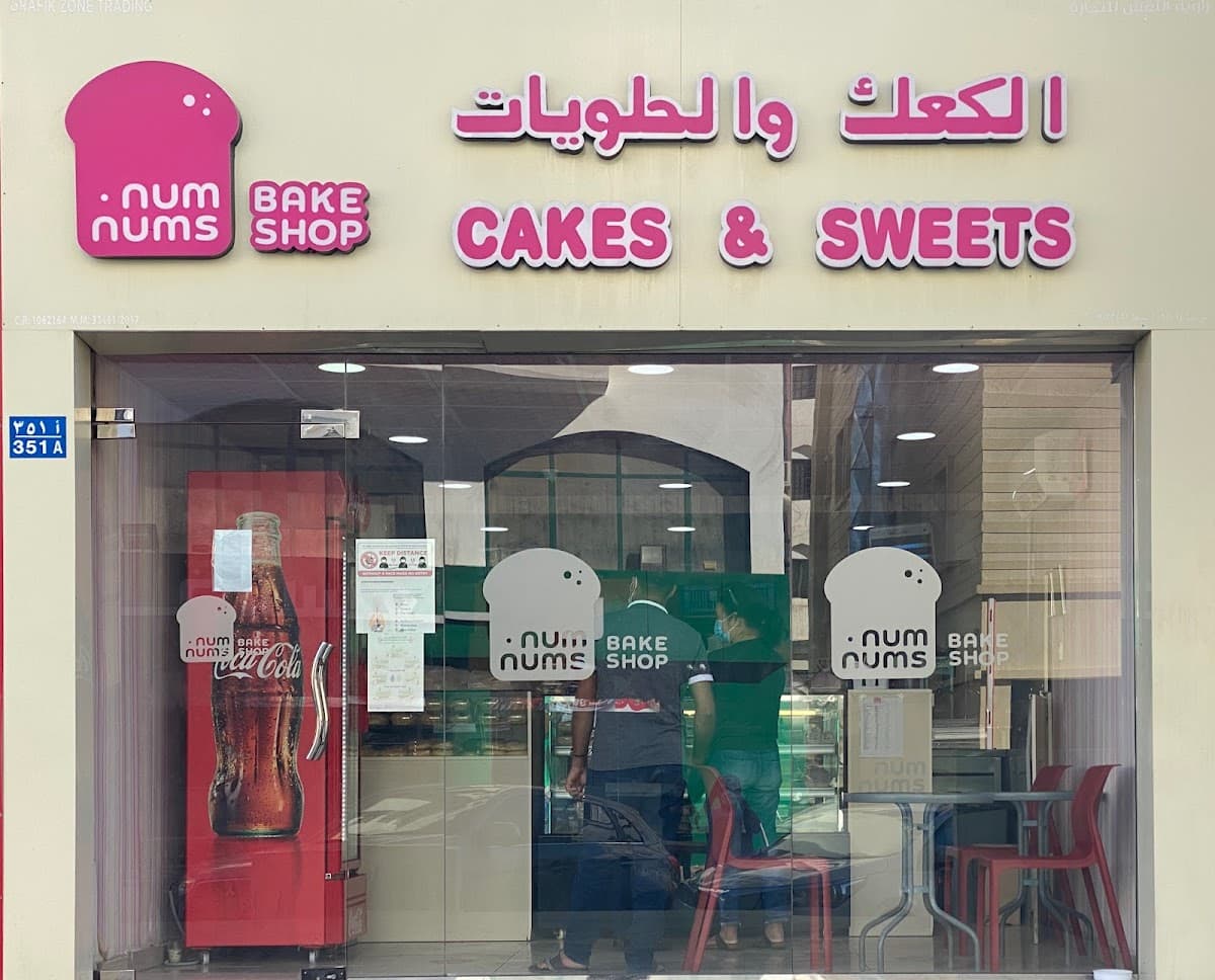 Wedding cake by Numnums Bakeshop & Cafe